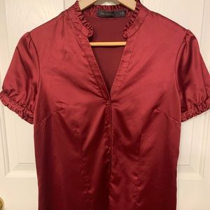 Limited short sleeve button up blouse